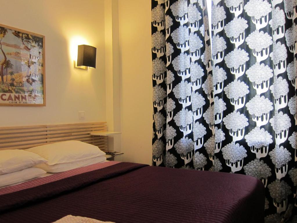 Brit Hotel Colbert Juan-les-Pins Zimmer foto